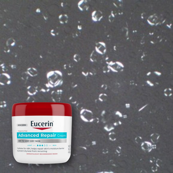 Cross-polarized microscopy of Eucerin Advanced Repair Cream showing large droplets and open partial rings rather than complete Maltese cross structures.