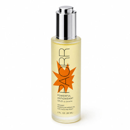 A bottle of Paorr organic Moroccan argan oil by Zerafite turned at an angle, the oil catching the light.