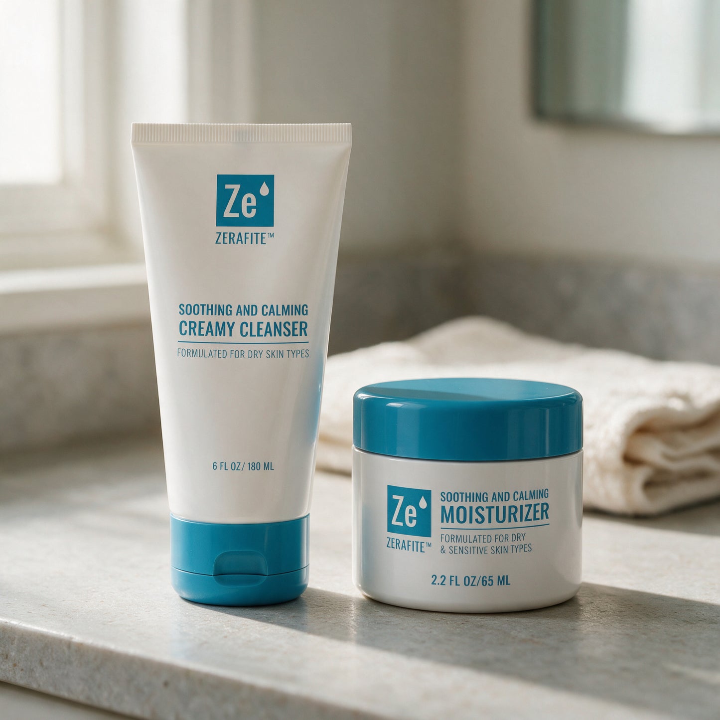 The Zerafite Soothing and Calming Bundle on a stone bathroom counter beside a folded towel, lit by a window.